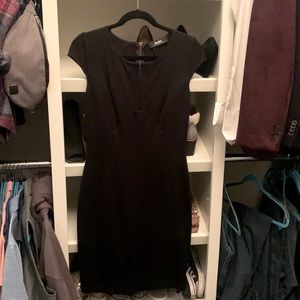 Black mid length cap sleeve pencil dress from Lulu’s. Size medium.